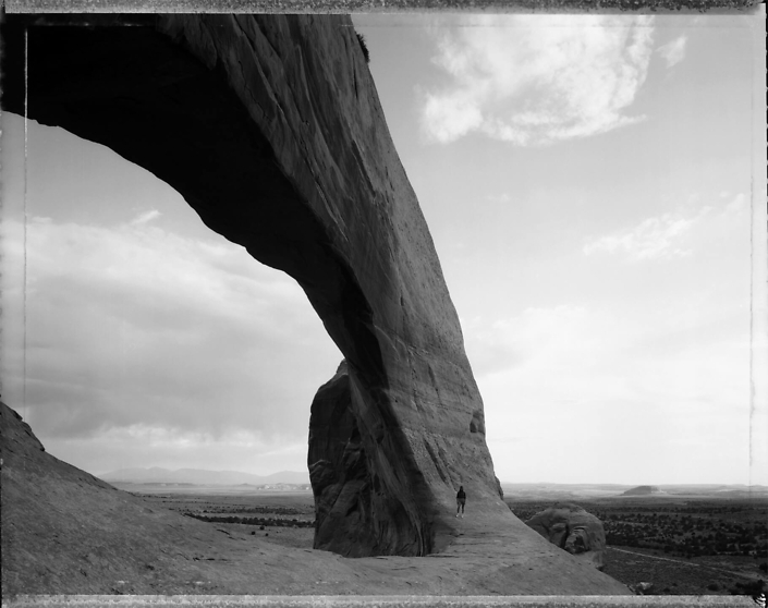 Mark Klett - Beneath the Great Arch, near Monticello, Utah, 6/21/82, 1982, gelatin silver print, 16 by 20 inches