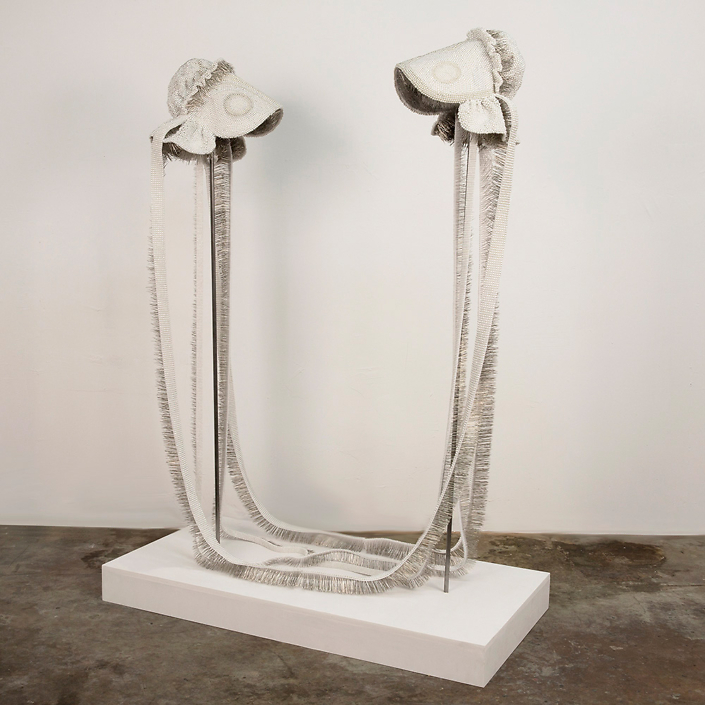 Angela Ellsworth - Seer Bonnet XXIV (Sister Sarah) and Seer Bonnet XXV (Sister Maria), 2016, 33,407 pearl corsage pins, fabric, steel, 65 by 48 by 24 inches