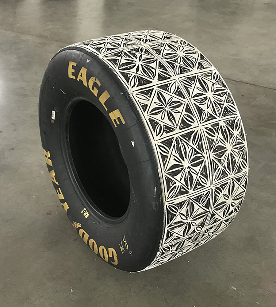 Sam Fresquez - Baseline, (SOLD), 2021, hand carved stock care tire, acrylic, 27.5" diameter x 12" deep