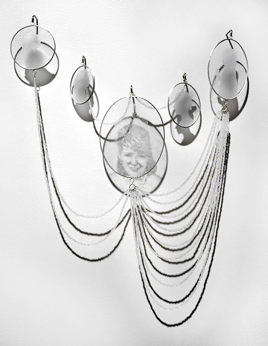 Charlotte Potter - Post Script - Amy, 2016, custom hand engraved glass cameos, glass beads, silver, 14 by 9 inches