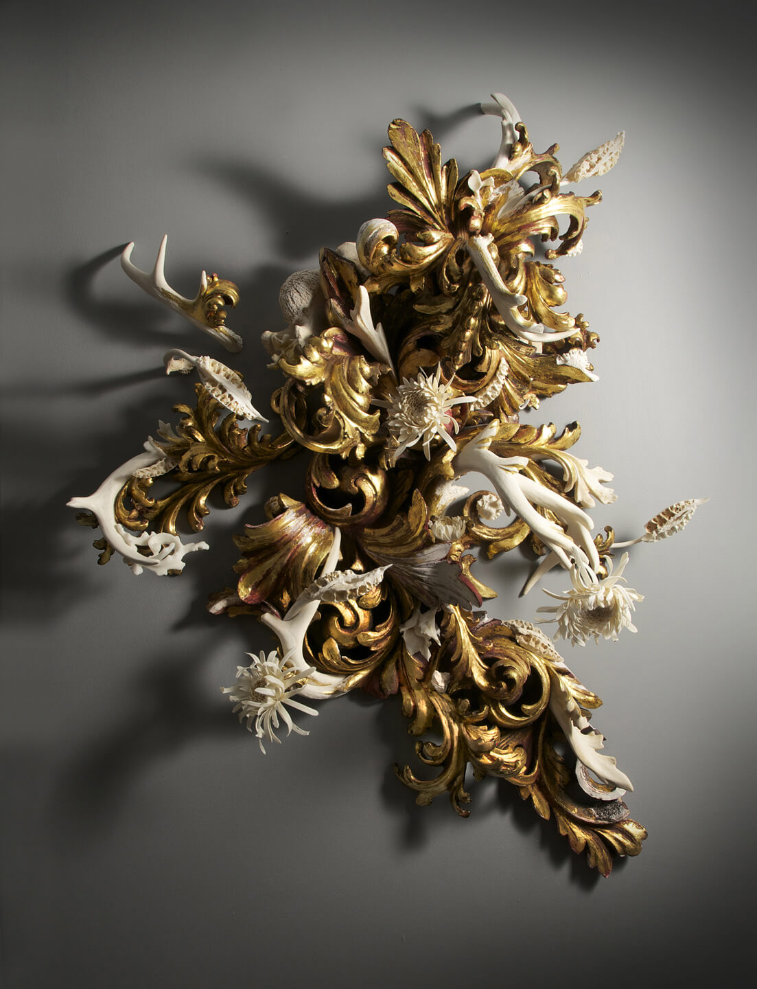Jennifer Trask - Thrive (SOLD), 2014, found 18th and 20th century frames, gold leaf, bone (deer, cow, python), antlers, fossilized wood, gesso, 23k gold leaf, resin, 46 by 38 by 11 inches