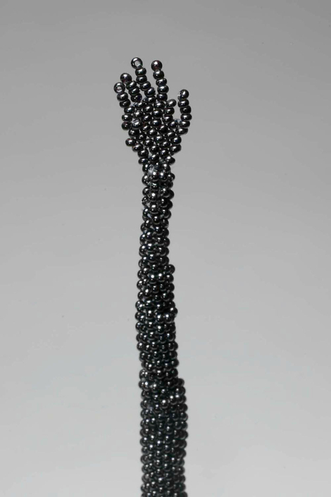 Sonya Clark - Reach (SOLD), 2004, glass beads, 15.5 by 1.5 by 1.5 inches