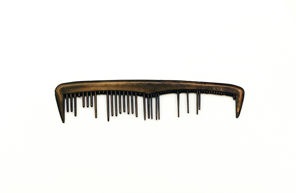 Sonya Clark - The comb never learned the name of the curl, 2015, cast bronze, 1" x 4.75" x .25" unframed, Unique Variant