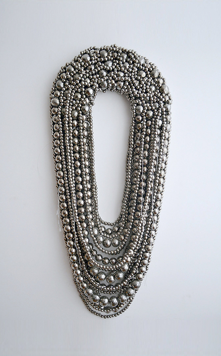 Xawery Wolski - Platinum Necklace I, 2013, terracotta, platinum slip, wood, 41 x 16 x 2.5 inches