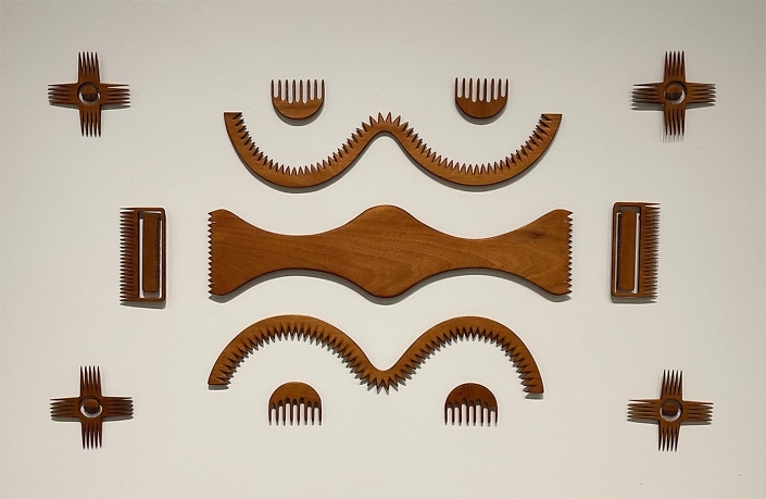 Merryn Omotayo Alaka and Sam Fresquez - Future Artifacts Set #3, 2022, hand carved African mahogany wood, 30" x 46"