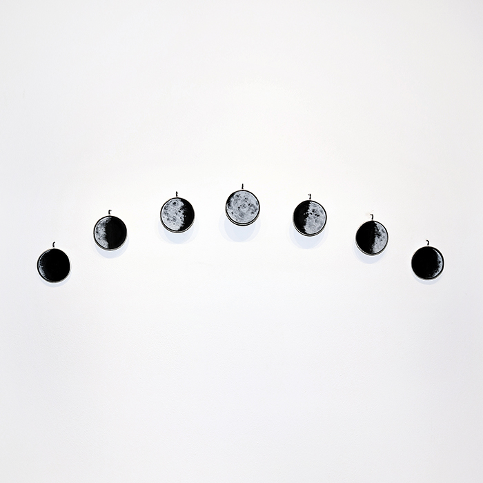 Charlotte Potter - Phases of the Moon, 2023, glass, 10.5" x 48" as shown (7 at 3" diameter each)